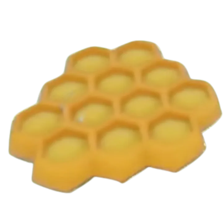 รวงผึ้ง Honeycomb สีทองมีช่องหกเหลี่ยมเรียงกัน